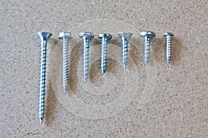 Seven different size screws
