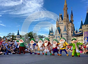 Seven dwarfs performancing at Walt Disney World Christmas party