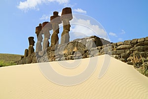 Seven gigantic Moai statues of Ahu Nau Nau ceremonial platform surrounded by soft coral sand of Anakena beach, Easter island, Chil