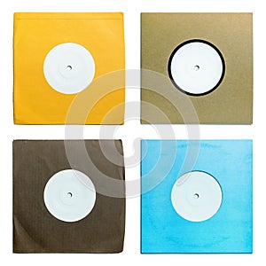 Single seven inch vinyl records in color sleeves photo