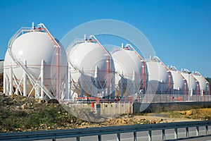 Seven LPG storage tanks.  Liquefied  petroleum gas (LPG) storage tanks. Gas plant photo