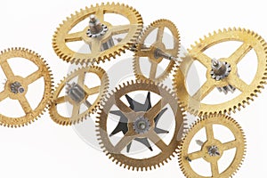 Seven old golden cogwheels