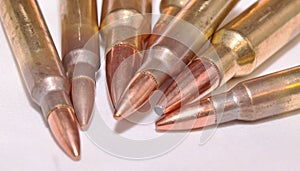 Seven rifle bullets, .223 and .300 Winchester Magnum calibers