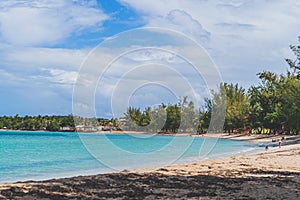 Seven Sea beach in tropical Fajardo Puerto Rico and white puffy clouds