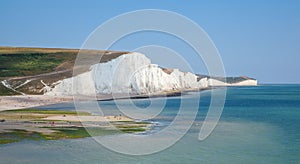 Seven Sisters Cliffs Seascape and People on the beach Sussex Eng