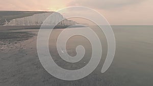 Seven Sisters cliffs at sunset, South Downs National Park, England, UK. Aerial d