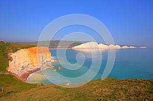 Seven Sisters cliffs uk with clear turquoise sea