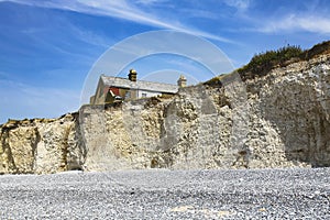 Seven Sisters, East Sussex, England, the UK; a view of the beach and the cliffs.