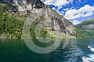 Seven Sisters waterfall over Geiranger Fjord in Sunnmore More og Romsdal Norway