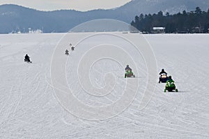 Seven snowmobiles on Lake Pleasant