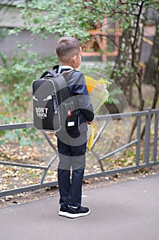 seven year old boy went to school, first day of school