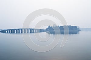 Seventeen Arch Bridge in the fog photo