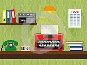 Seventies retro work place with typewriter, telephone and cassette recorder, vintage wallpaper background