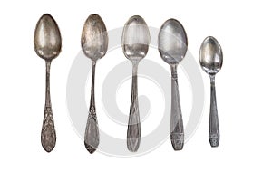 Several antique silver spoons