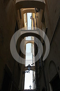 Several Arches between the tall buildings