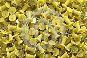 several assorted colors of plastic push pins