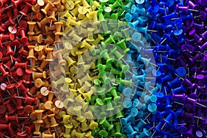 several assorted colors of plastic push pins