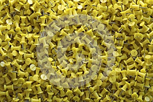 several assorted colors of plastic push pins