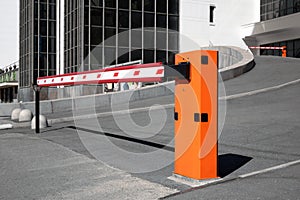 Several automatic barriers at the entrance to the parking lot near the public building