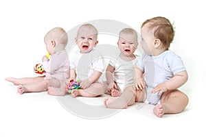 Several babies over white