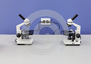 Several biological microscopes