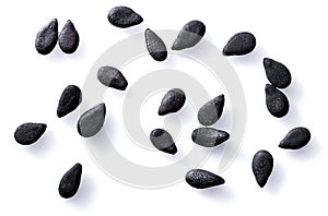 Several black sesame seeds isolated on white background