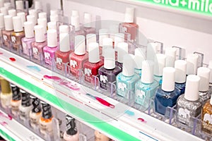 A row of nail polish bottles