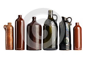 Several brown bottles, on a white, isolated background.