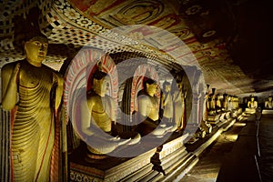 Buddha statues in Dhyana Mudra position in Dambulla photo