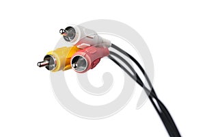 Several cables with RCA connectors for audio and video on white isolated