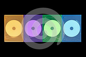Several colored boxes DVD / CD on black background