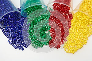 several colored plastic granulate resins laboratory photo