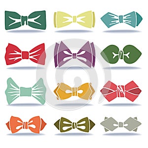 Several colored silhouettes of bow tie with shadow