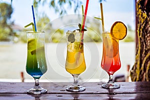 Several colorful cocktails outdoor