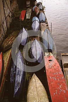 Several colorful ships with their hull upkeep photo