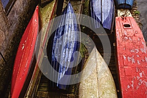 Several colorful ships with their hull upkeep photo