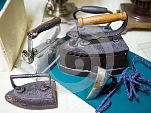Several different in size and arrangement of old irons