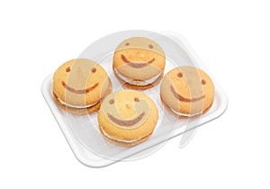 Several flaky cookies with the image of smiling face