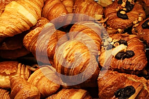 Several freshly baked butter and chocolate croissants