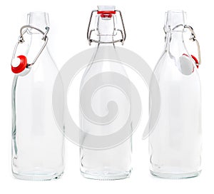 Several glass bottles with 500 ml soda type closures. Without label and isolated on white background