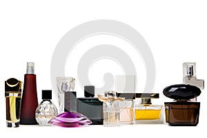 Several glass bottles on perfume on white background