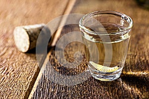 Several glasses with mezcal or mescal is commonly known as