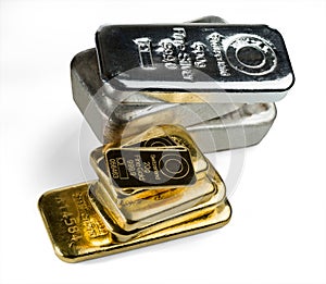 Several gold and silver bars isolated on white background.
