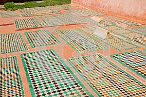 Several graves of soldiers and servants in the garden of the Saadian Tombs