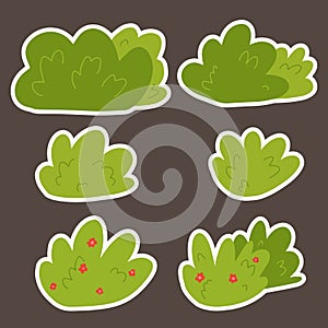 Several green bushes with flowers in the set. Bushes in cartoon style for postcard decoration