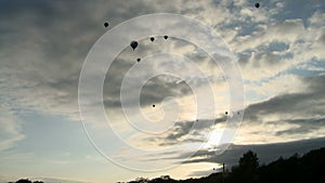 Several hot air balloons in the sky aerial view