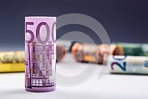 Several hundred euro banknotes stacked by value. Euro money concept. Rolls Euro banknotes. Euro currency.