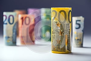 Several hundred euro banknotes stacked by value. Euro money concept. Rolls Euro banknotes. Euro currency.