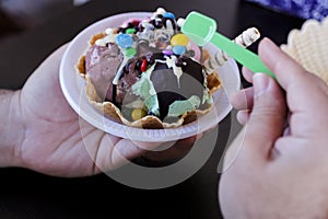 Several scoops of ice cream of chocolat ÃÂ and mint photo