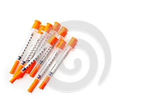 Several insulin syringes for for injection white isolated background